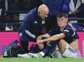 Nathan Patterson receives treatment. Picture:  Ian MacNicol/Getty Images