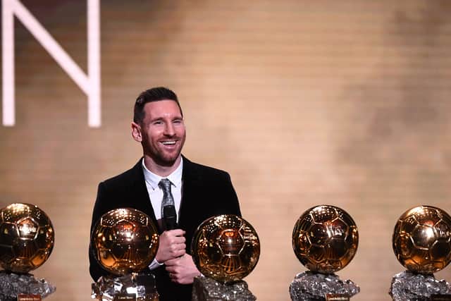 Lionel Messi with six of his seven Ballon d’Or trophies in 2019