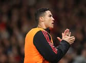  Cristiano Ronaldo of Manchester United warms up on the touchline during the Premier League match  (Photo by Alex Pantling/Getty Images)