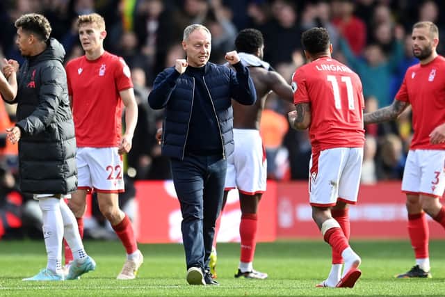 Steve Cooper, Manager of Nottingham Forest celebrates with Jesse Lingard following the Premier League match (Photo by Michael Regan/Getty Images)