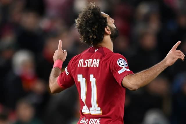 Mohamed Salah of Liverpool celebrates after scoring their team's first goal during the UEFA Champions League group A match between Liverpool FC and SSC Napoli at Anfield on November 01, 2022 in Liverpool, England. (Photo by Michael Regan/Getty Images)