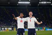 Jude Bellingham and Declan Rice of England celebrate after victory in the UEFA Euro 2020 Championship Quarter-final against Ukraine (Photo by Alessandra Tarantino - Pool/Getty Images)