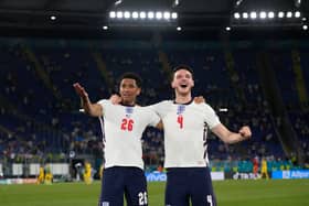 Jude Bellingham and Declan Rice of England celebrate after victory in the UEFA Euro 2020 Championship Quarter-final against Ukraine (Photo by Alessandra Tarantino - Pool/Getty Images)