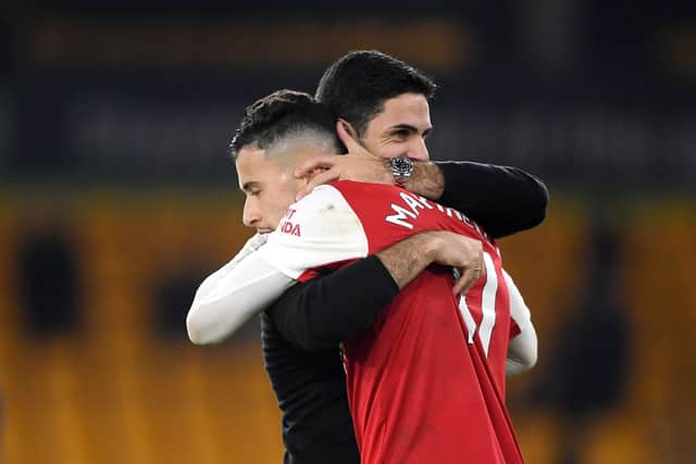 Mikel Arteta, Manager of Arsenal embraces Gabriel Martinelli following their side's victory in the Premier League match (Photo by Harriet Lander/Getty Images)