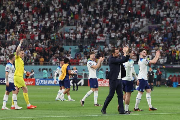 Gareth Southgate leads his England players in thanking fans after the 6-2 win over Iran in Qatar.