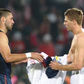 England’s midfielder Steven Gerrard (R).
