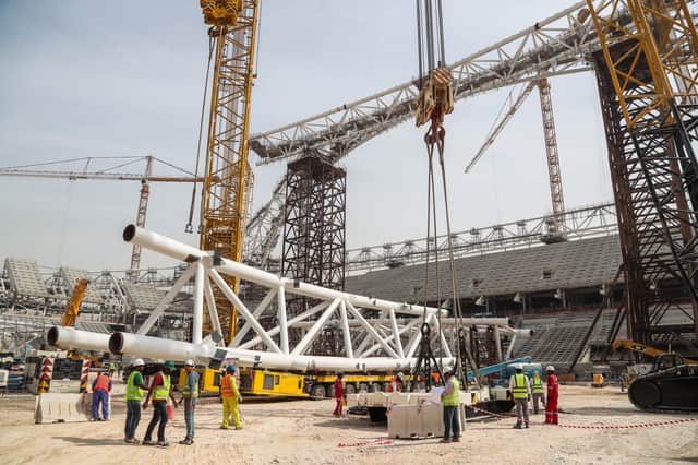 Workers on the construction site at the Al-Wakrah Stadium in 2018 (AFP via Getty Images)
