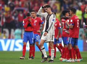 Kai Havertz of Germany walks off the pitch after his side exited the World Cup despite a 4-2 win against Costa Rica (Photo by Alexander Hassenstein/Getty Images)