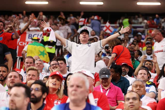 England fans show their support during the FIFA World Cup Qatar 2022 Round of 16 match against Senegal (Photo by Julian Finney/Getty Images)