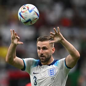  Luke Shaw puts the ball back in play from the touchline during the Qatar 2022 World Cup round of 16 football match between England and Senegal 