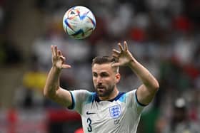 Luke Shaw puts the ball back in play from the touchline during the Qatar 2022 World Cup round of 16 football match between England and Senegal 