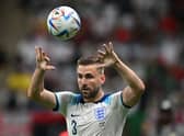  Luke Shaw puts the ball back in play from the touchline during the Qatar 2022 World Cup round of 16 football match between England and Senegal 