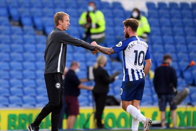 Graham Potter interacts with Alexis Mac Allister and Hove Albion at full-time after the Premier League match against Newcastle United  (Photo by Mike Hewitt/Getty Images)