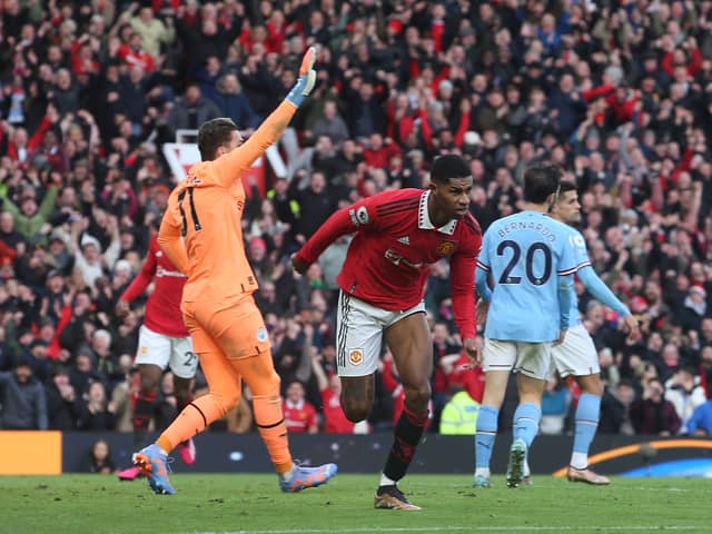 Marcus Rashford celebrates scoring Manchester United’s second goal in their win over local rivals Manchester City (Photo by Matthew Peters/Manchester United via Getty Images)