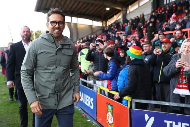 WREXHAM, WALES - JANUARY 29: Ryan Reynolds, Co-Owner of Wrexham pitchside ahead of the Emirates FA Cup Fourth Round match between Wrexham and Sheffield United at Racecourse Ground on January 29, 2023 in Wrexham, Wales. (Photo by Michael Steele/Getty Images)