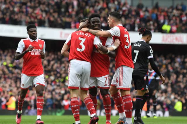 Arsenal celebrate another win with an unlikely title in their sights