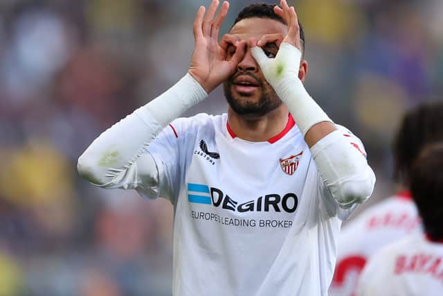 Youssef En-Nesyri celebrates scoring Sevilla’s second against Cadiz