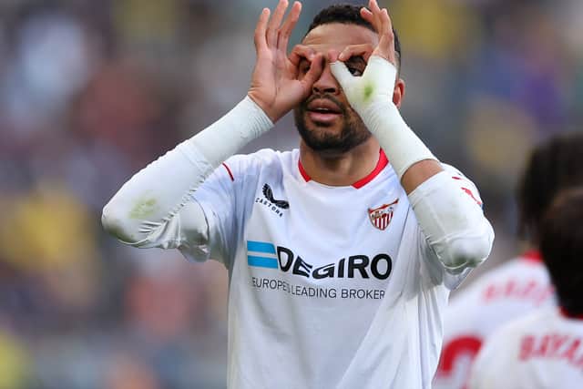 Yousseff En-Nesyri celebrates scoring Sevilla’s second against Cadiz