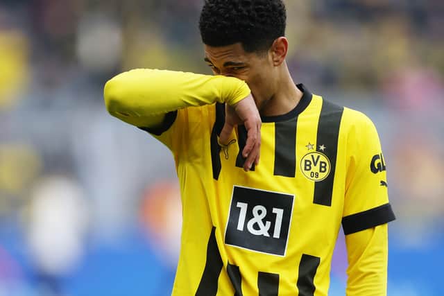 Jude Bellingham wipes away some definitely real tears after hearing he might not have to play in the Europa League next season.