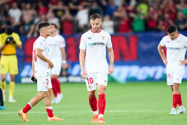 Sevilla players, including Ivan Rakitic, following their stunning late defeat to Osasuna in the Copa del Rey