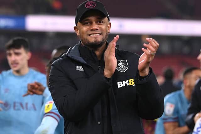 Vincent Kompany celebrates promotion following Burnley’s match with Middlesbrough in early April.