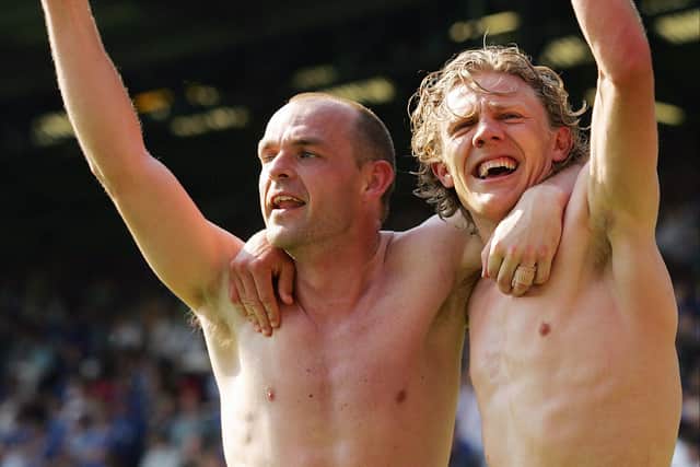 Danny Murphy and Jimmy Bullard celebrate Fulham’s unlikely escape.
