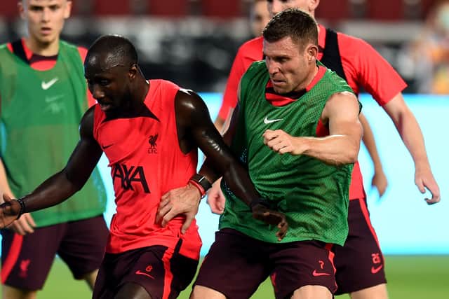 Liverpool vice-captain James Milner, right, with Naby Keita during training. Picture: Andrew Powell/Liverpool FC via Getty Images