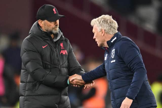 Jurgen Klopp manager of Liverpool with West Ham United manager David Moyes during the Premier League match between West Ham United and Liverpool FC at London Stadium on April 26, 2023 in London, England. (Photo by Andrew Powell/Liverpool FC via Getty Images)