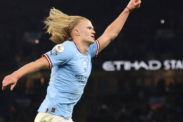 Erling Haaland, the golden retriever with Gary Busey’s lips, celebrates his goal.