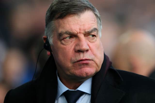Allardyce as Everton manager with his earpiece in place - communicating with a coach positioned in the stands was another innovation of his.