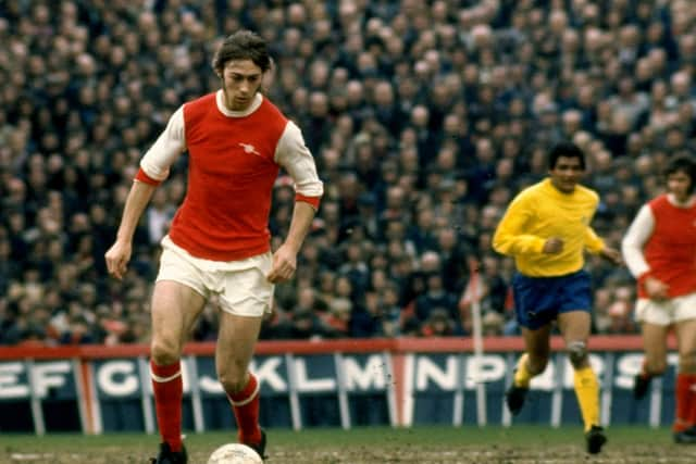 Charlie George in action at Highbury.