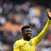 Inter Milan's Cameroonian goalkeeper Andre Onana celebrates after winning the Italian Serie A football match (Photo by GABRIEL BOUYS/AFP via Getty Images)