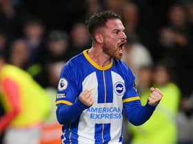 Alexis Mac Allister celebrates scoring a goal for Brighton