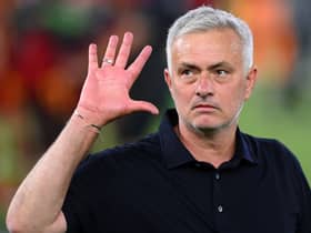 Jose Mourinho signals to the five European trophies he has won