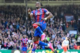  Crystal Palace's Ivorian striker Wilfried Zaha celebrates after scoring their second goal during the English Premier League (Photo by JUSTIN TALLIS/AFP via Getty Images)