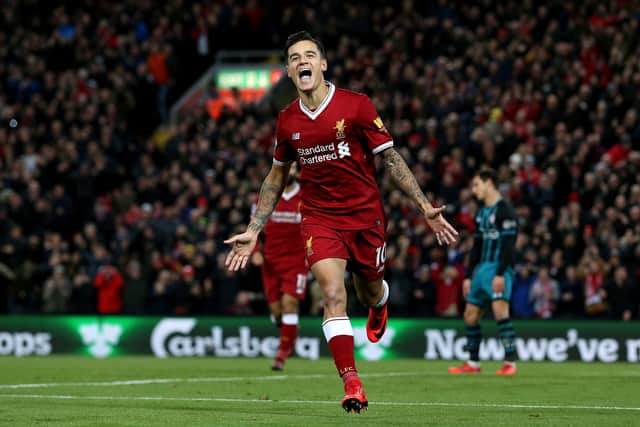 Philippe Coutinho of Liverpool celebrates scoring a goal