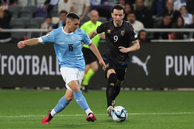 Israel’s midfielder Oscar Gloukh (L) is marked by Kosovo’s midfielder Bersant Celina during the UEFA Euro 2024 group (Photo by JACK GUEZ/AFP via Getty Images)