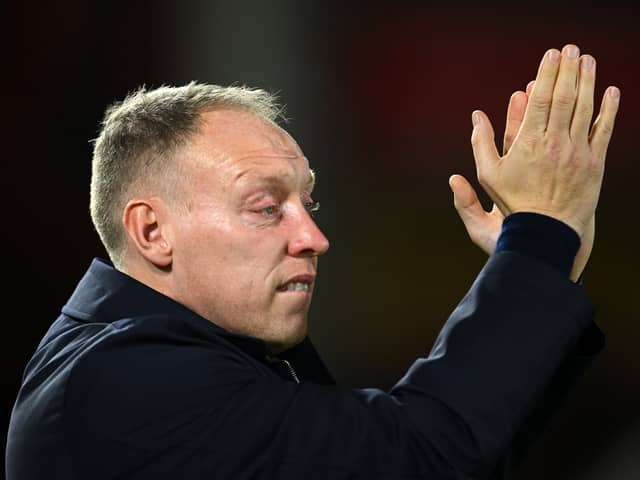 Nottingham Forest manager Steve Cooper applauds the fans after a match
