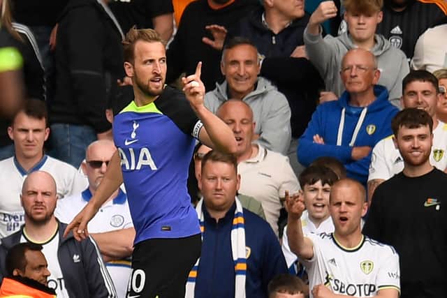 Tottenham Hotspur’s English striker Harry Kane celebrates after scoring their third goal during the English Premier League . (Photo by Oli SCARFF / AFP) / 
