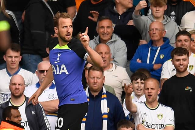 Tottenham Hotspur’s English striker Harry Kane celebrates after scoring their third goal during the English Premier League . (Photo by Oli SCARFF / AFP) /