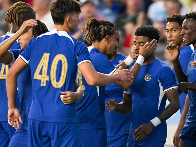 Ian Maatsen #38 of Chelsea FC celebrates with teammates after a goal against Wrexham  (Photo by Grant Halverson/Getty Images)