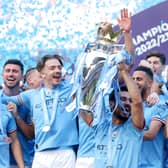 Manchester City lift the Premier League trophy