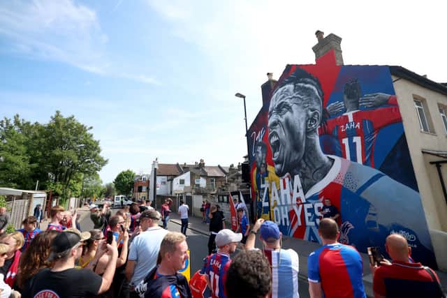  A general view of a new Wilfried Zaha mural as fans arrive at the stadium prior to the Premier League match  (Photo by Tom Dulat/Getty Images)