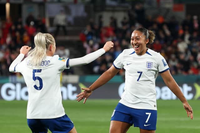 Lauren James of England celebrates with Alex Greenwood after scoring a goal