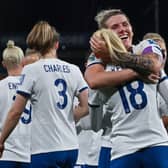 England’s Chloe Kelly is embraced by Millie Bright after scoring a goal at the World Cup