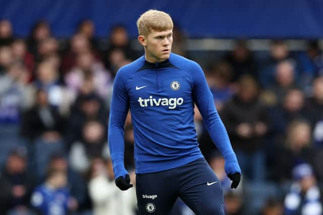 Lewis Hall of Chelsea warms up prior to the Premier League match between Chelsea FC  (Photo by Julian Finney/Getty Images)