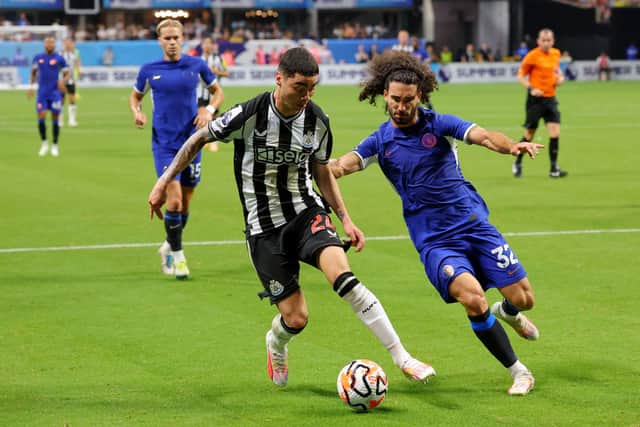 Miguel Almiron of Newcastle United is challenged by Marc Cucurella of Chelsea during the Premier League (Photo by Kevin C. Cox/Getty Images for Premier League)