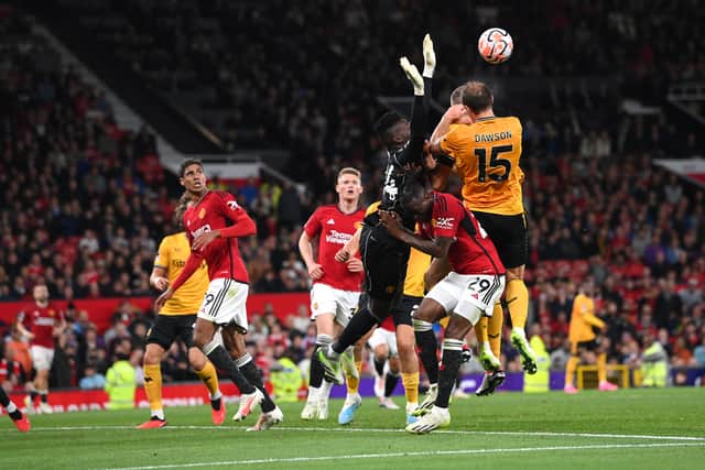 Andre Onana recklessly challenges Wolves players (Image: Getty Images)