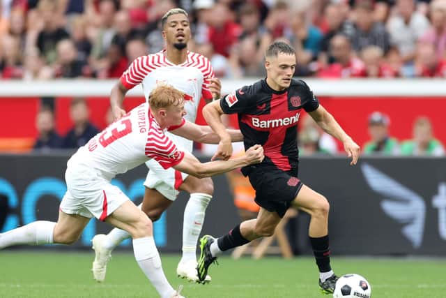 The RB Leipzig defence resort to desperate measures against Florian Wirtz during last weekend’s match.