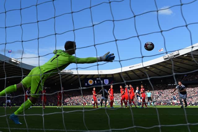 England goalkeeper Joe Hart was arguably at fault for both of Scotland’s goals from free-kicks. 